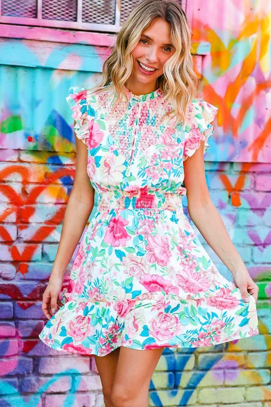 Under Your Spell Floral Smocked Flutter Sleeve Ruffle Mini Dress Fashionable Mini Dress with Pockets Under Your Spell Floral Smocked Flutter Sleeve Ruffle Mini Dress Fashionable Mini Dress with Pockets
